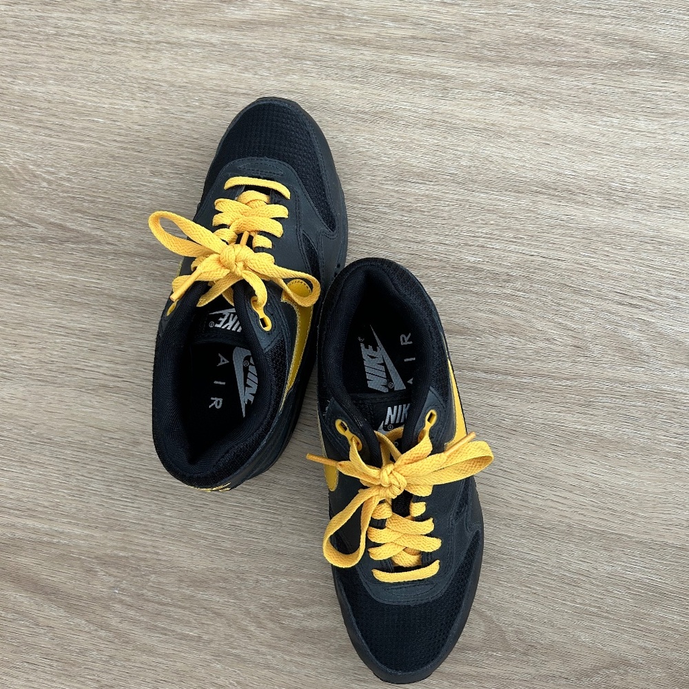 Black Nike Sneakers with Yellow Laces